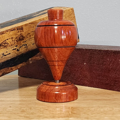 Padauk wood tompo with cord