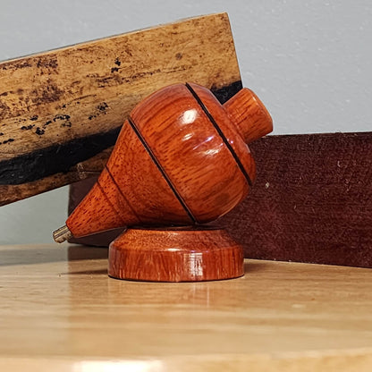 Padauk wood tompo with cord